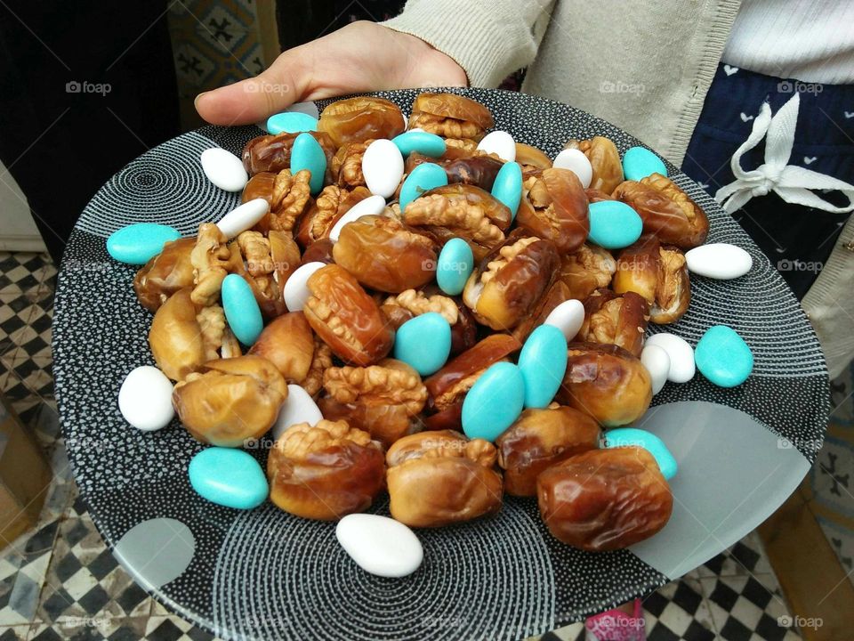 plate of sweets and date.