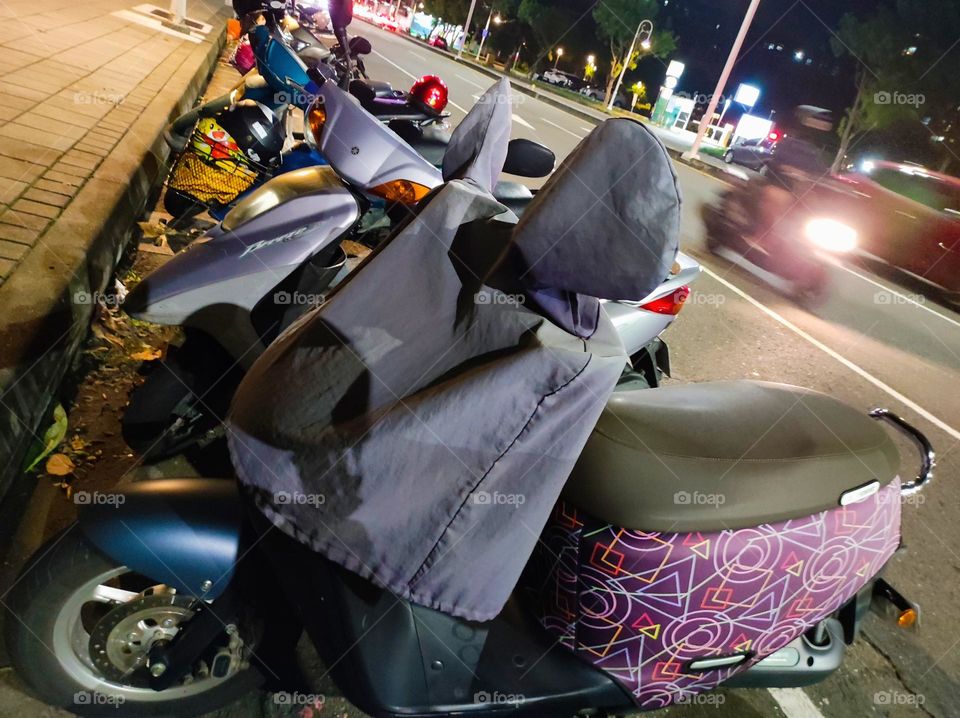 Scooter covered with clothes
