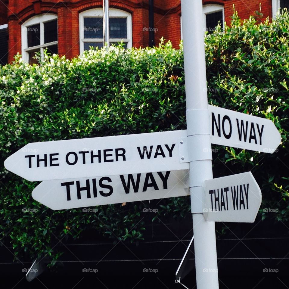 A sign post. National Geographic Society, London. Travel Photo exhibition