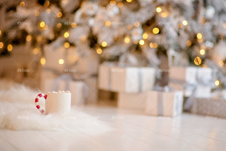 cup of coffee in a cozy festive Christmas atmosphere