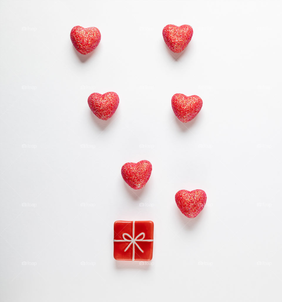 Red hearts on a white background. Valentine's Day.