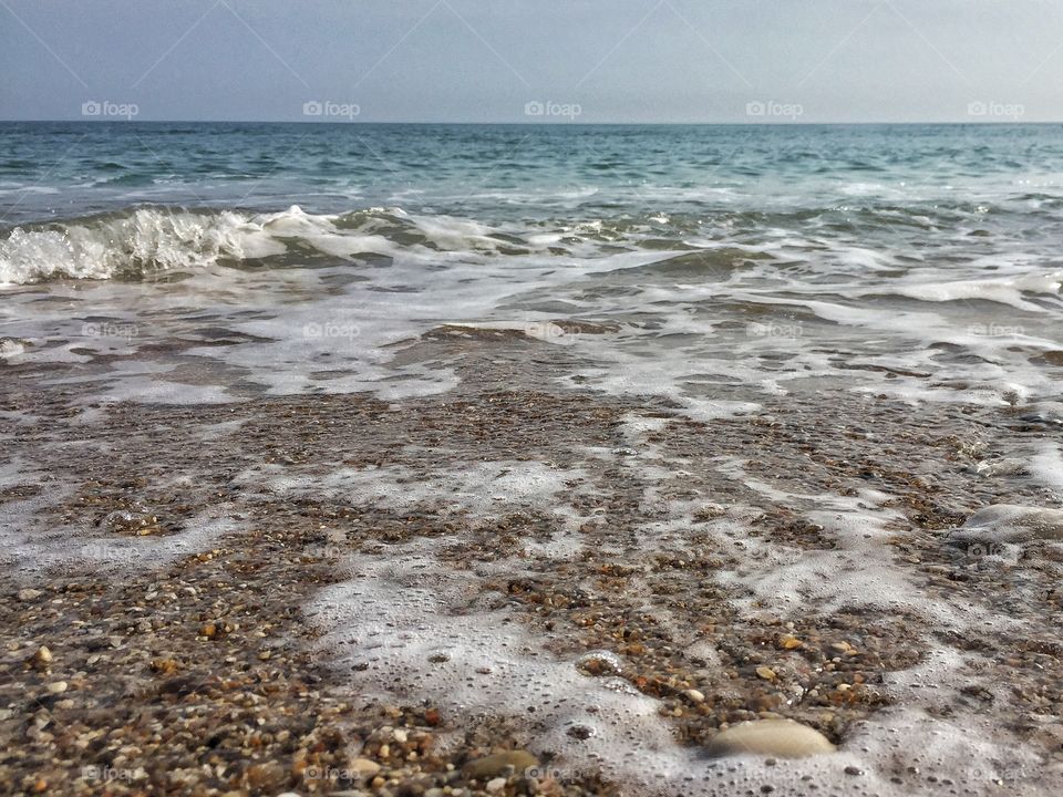 Scenic view of sea against clear sky