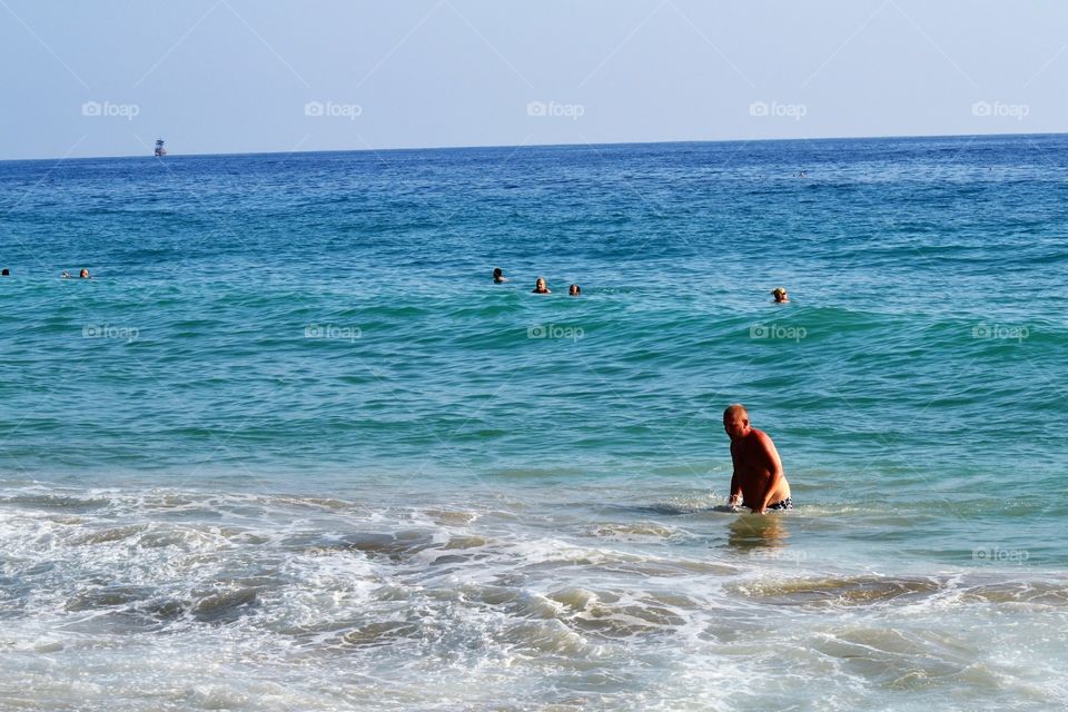 Tourists enjoying in sea