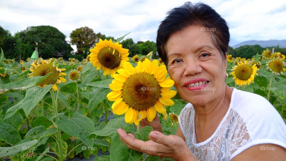 A mother and a sunflower