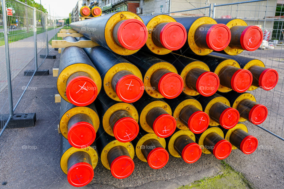 stacked pipes for replacement and reconstruction of the heating system pipelines in the city