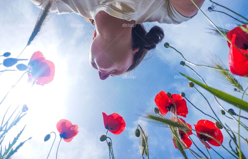 Selfie with spring flowers and blue sky