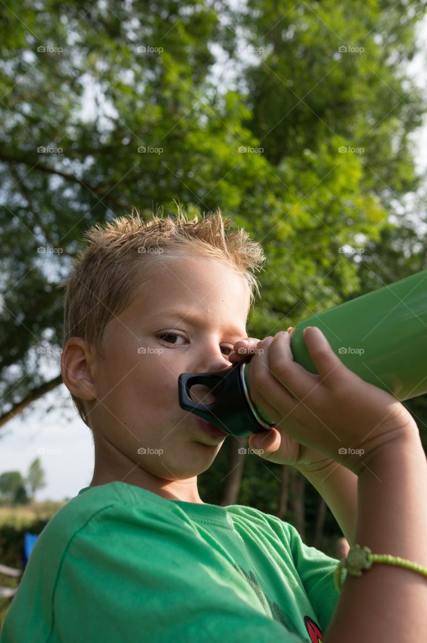 Boy drinking 