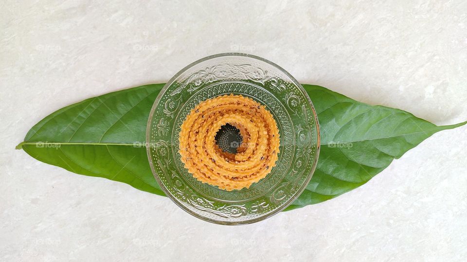 The Circle of Snacks, murukku, a snack usually made of rice or urad dal flour, formed into a twisty shape, Indian snacks