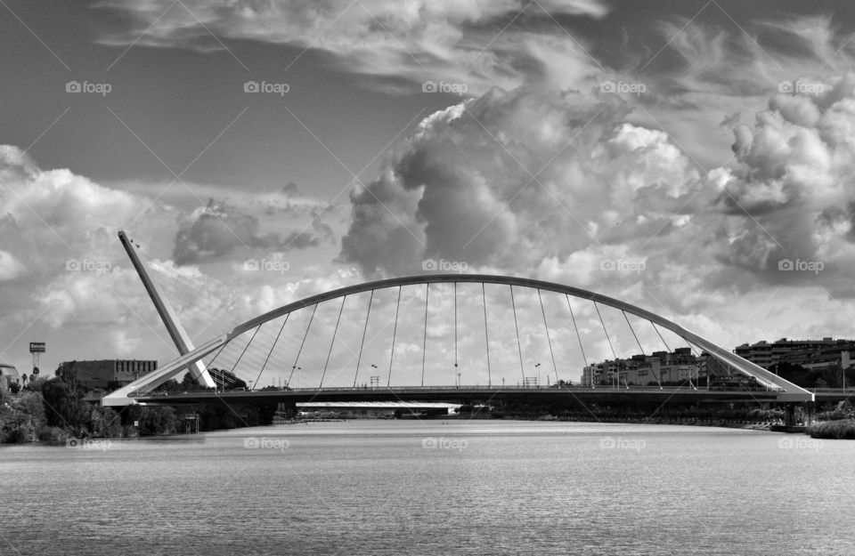 La Barqueta Bridge. View of La Barqueta Bridge and Alamillo Bridge in the background. Sevilla, Spain.