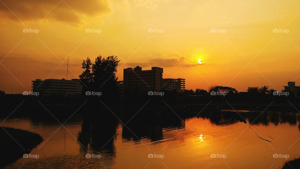 Buildings with sunset background