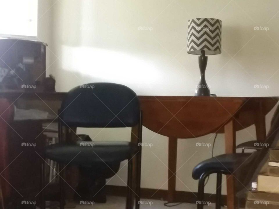 table chairs wall brown blue light