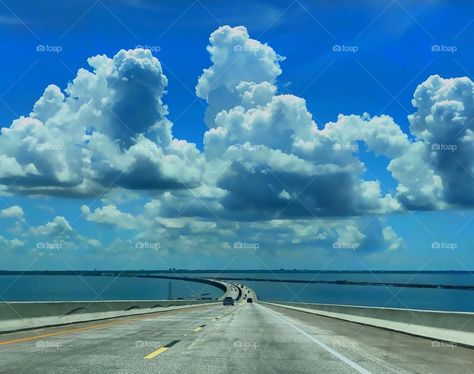 Connection over blue ocean with a spectacular blue sky above.