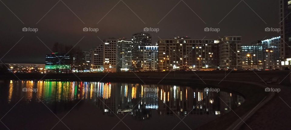 very beautiful night light windows city and reflection
