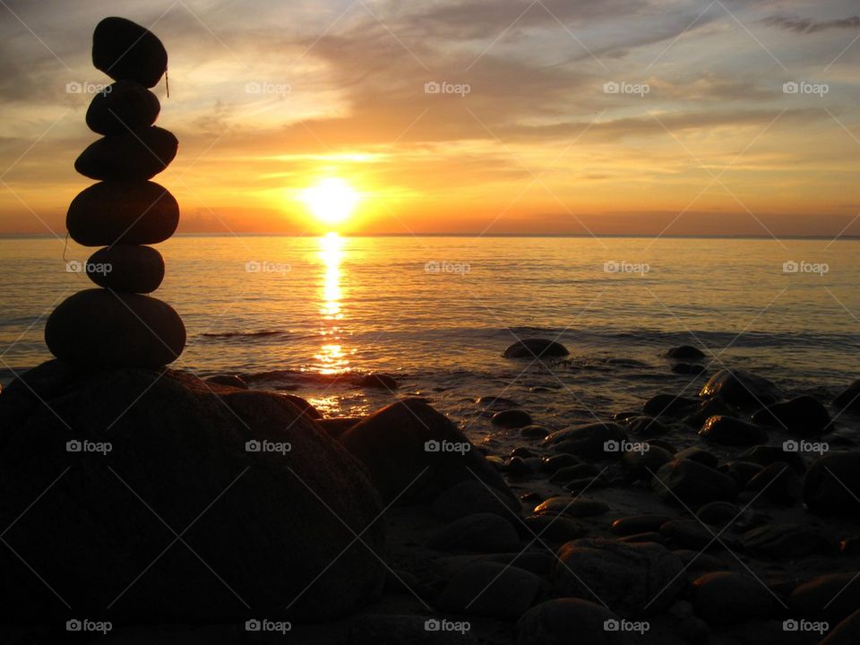 Silhouette of pebbles during sunset