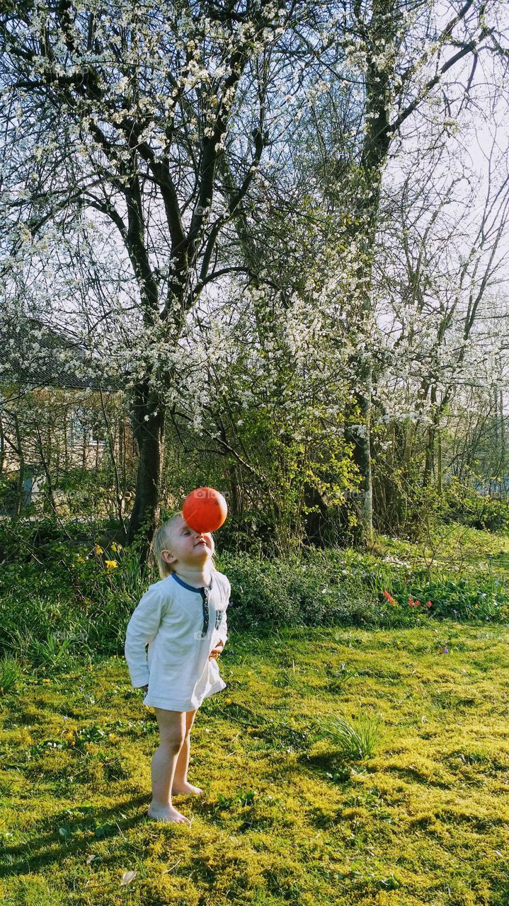 Boy just before he catches ball with head. involuntary header
