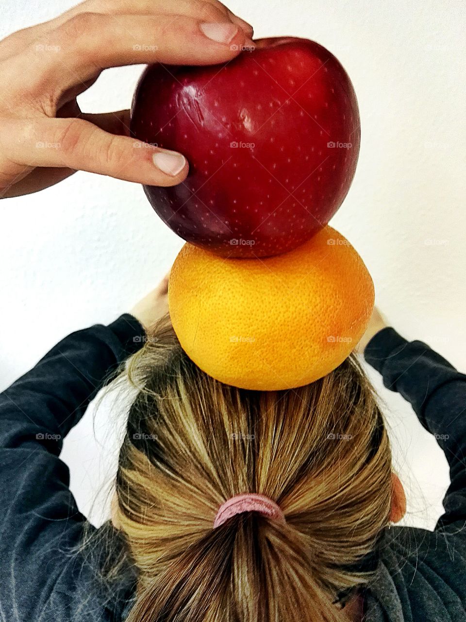 holding fruits on head