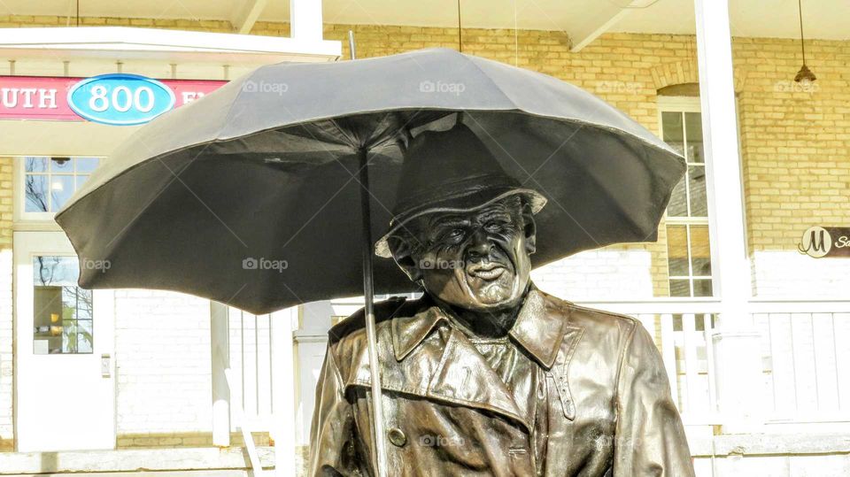 Statue protects the rain