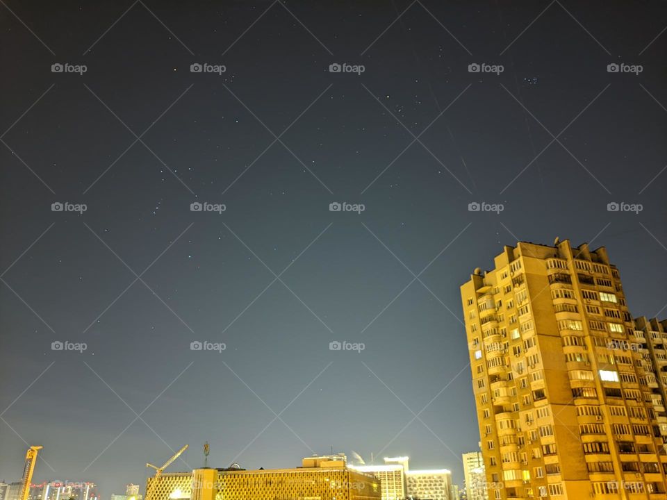 night starry sky in the city of Kiev, Ukraine