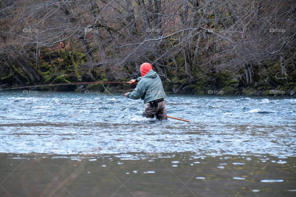 Up To His Knees In Flyfishing.  