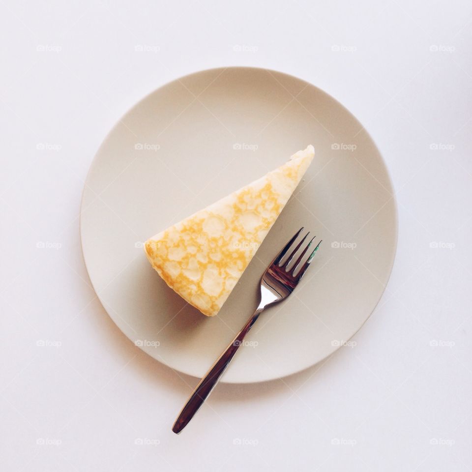 Vanilla crepe cake on a white background