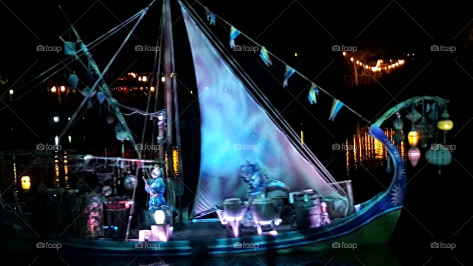 An illuminated ship makes their way into the waters of Discovery River during Rivers of Light at Animal Kingdom at the Walt Disney World Resort in Orlando, Florida.