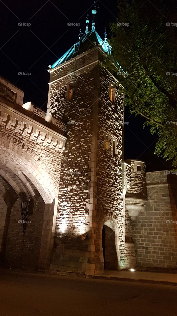 Tower of one of the entrances in the old walls in Québec city at night. Québec city, Québec, Canada.