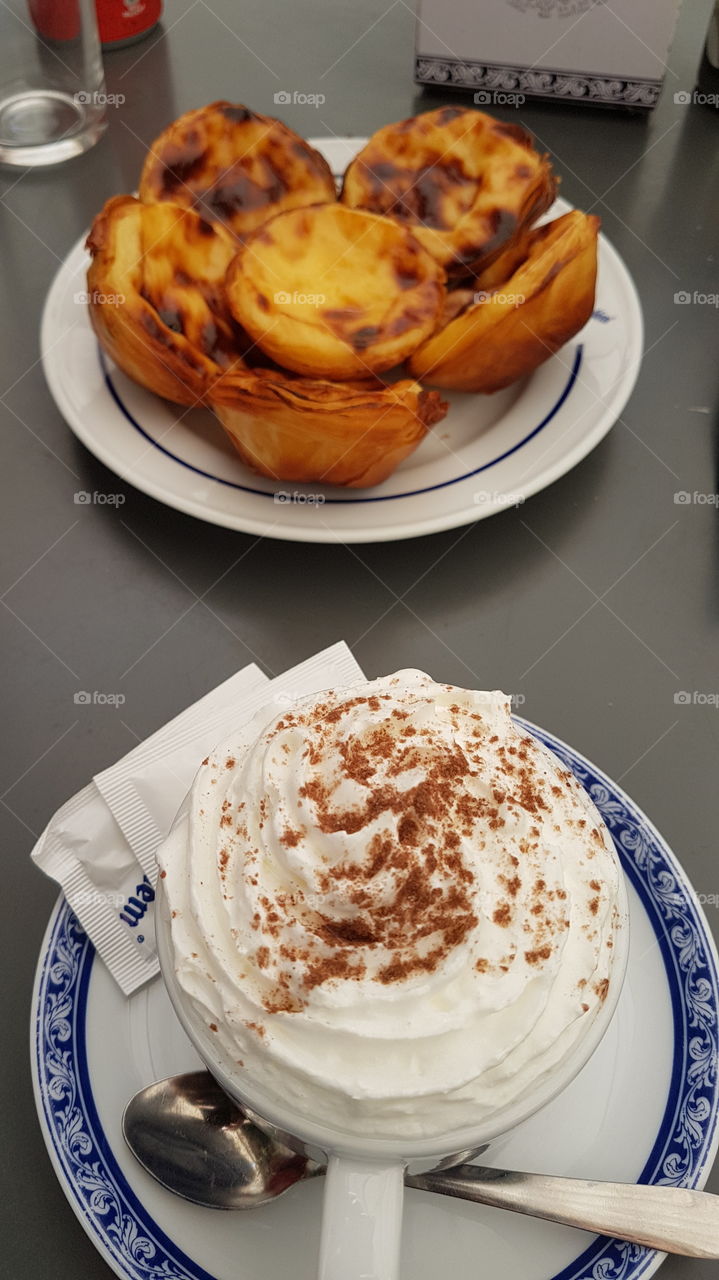 An european combo (portuguese traditional pastry and cappucino, more italian) for a gourmand snack