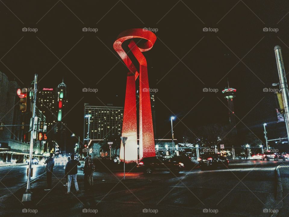 A gift from the Mexican government,  Night time view of La Antorcha de la Amistad (Spanish for "The Torch of Friendship"). A monumental abstract sculpture by Mexican sculptor Sebastián, installed in Downtown San Antonio, in the U.S. state of Texas.