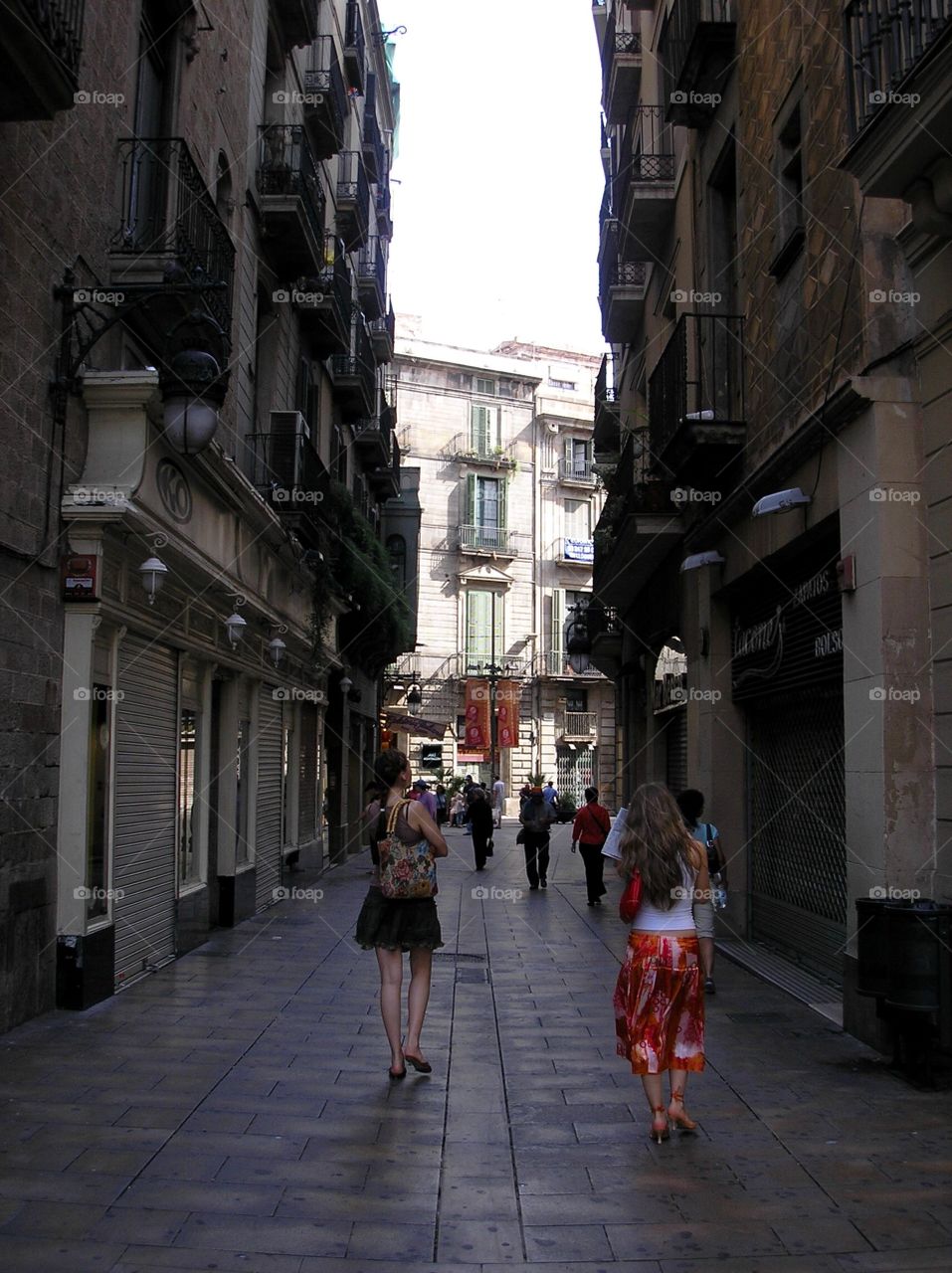 Walking in the gothic district in Barcelona