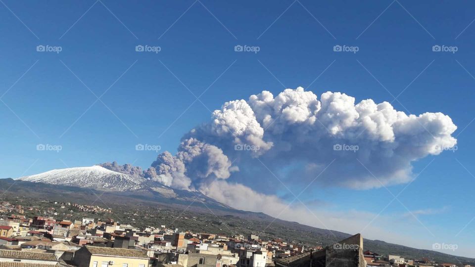 Etna volcano erupting and spewing ash