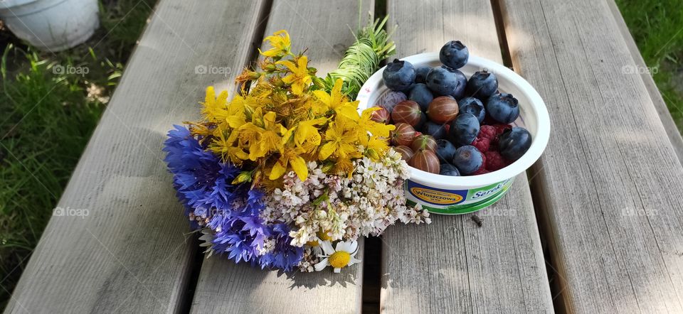 Freshly picked up fruits and flowers