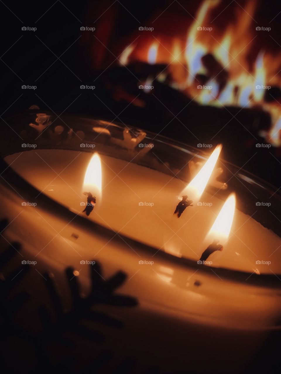 Candle in front of a fire place—taken in Dyer, Indiana 