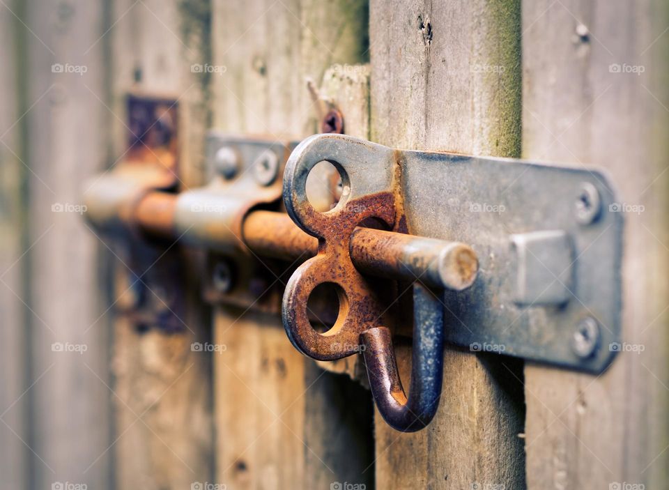 Old metal rusty lock closeup