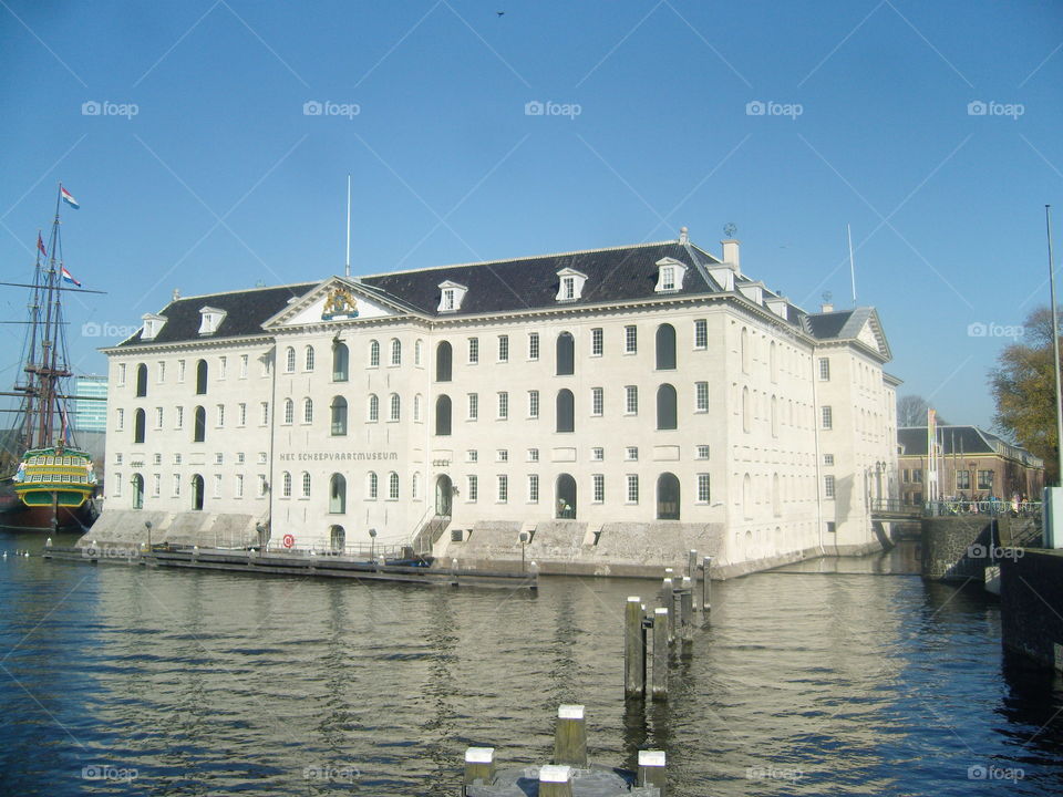House rounded by water
