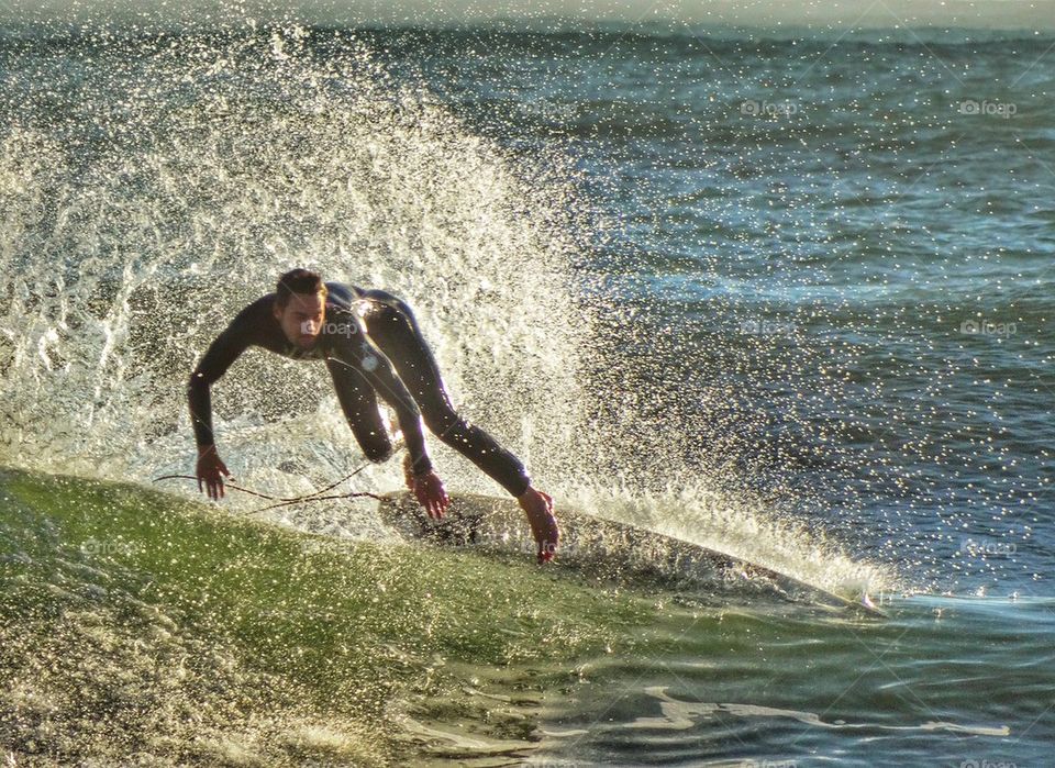 Surfer Riding A Powerful Wave. Epic Surfing In California
