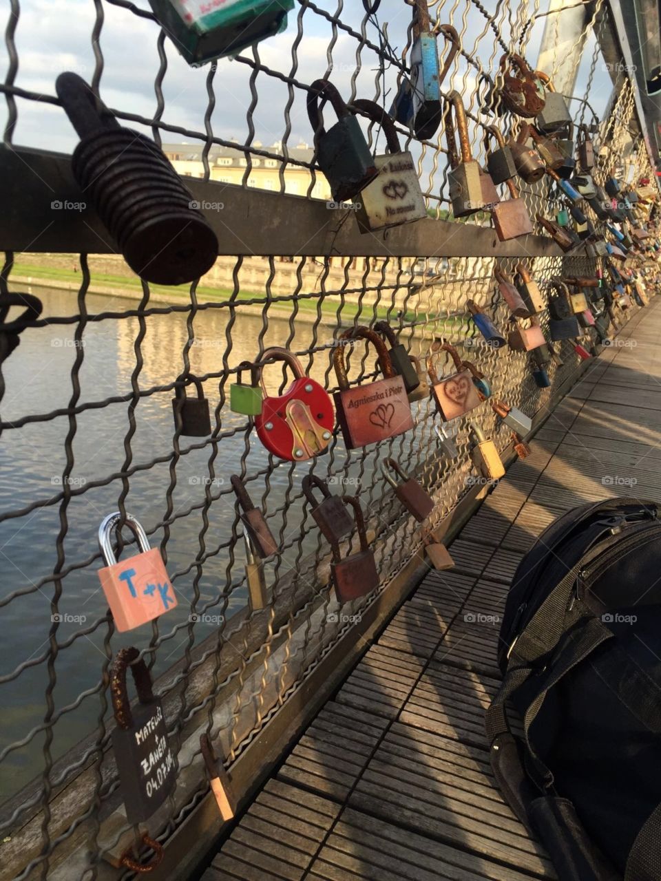 Love lock bridge over the Wistula river, Kraków 