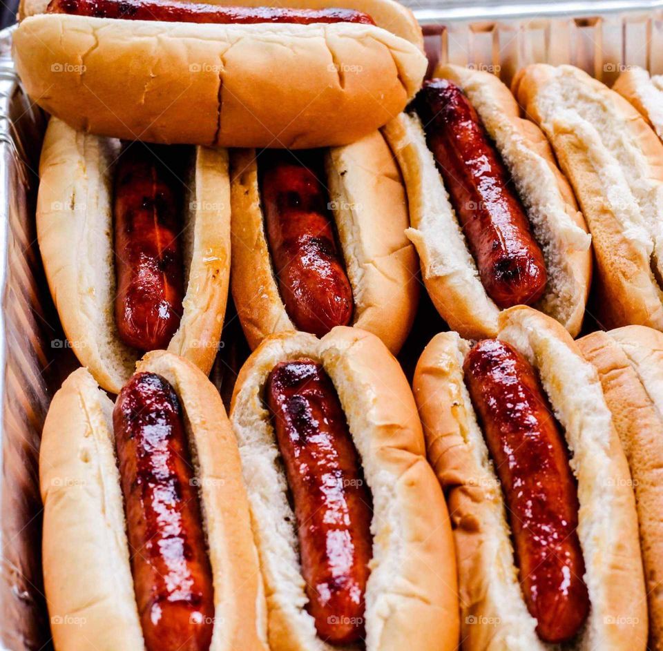 summer barbecue hotdogs in buns