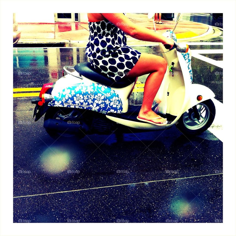 Girl on scooter at Miami Beach
