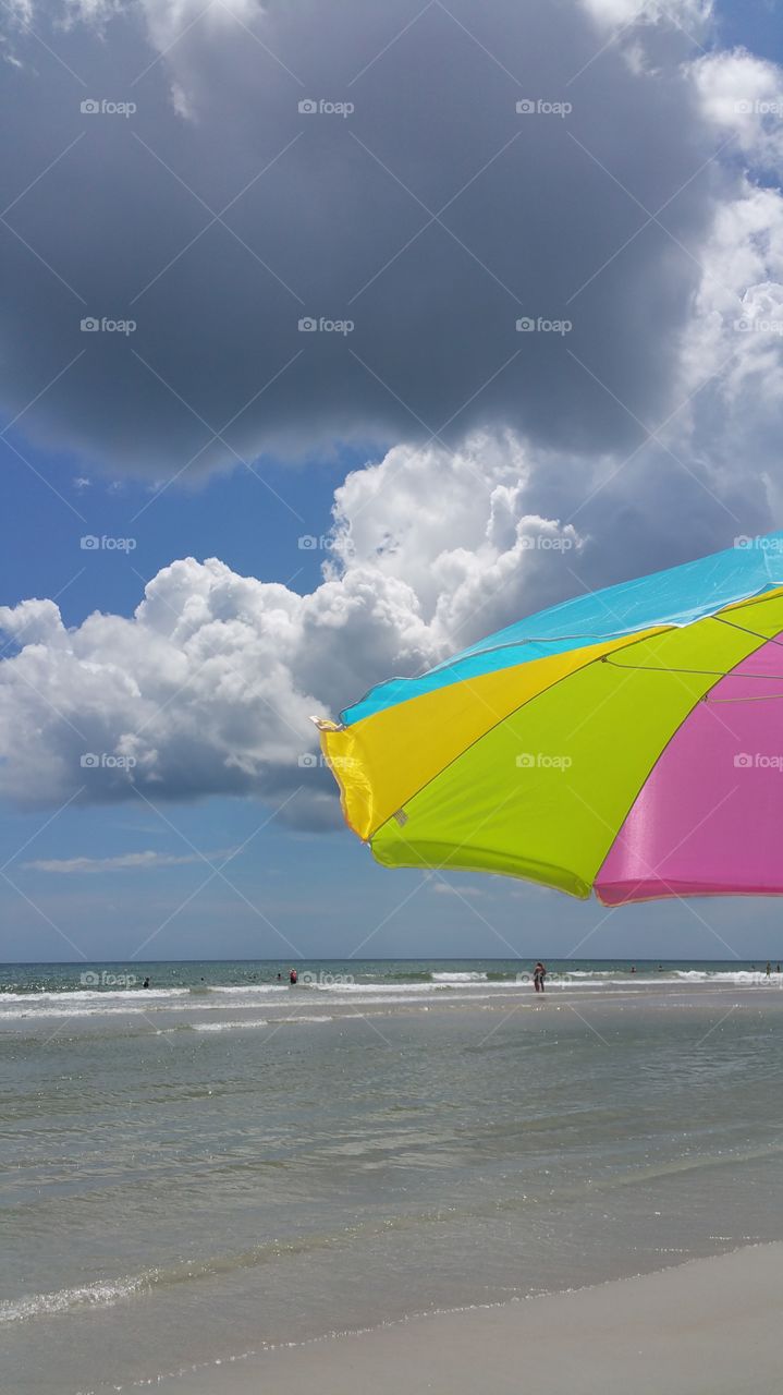 Beach Umbrella. Visited the beach while angry cloud brews.
