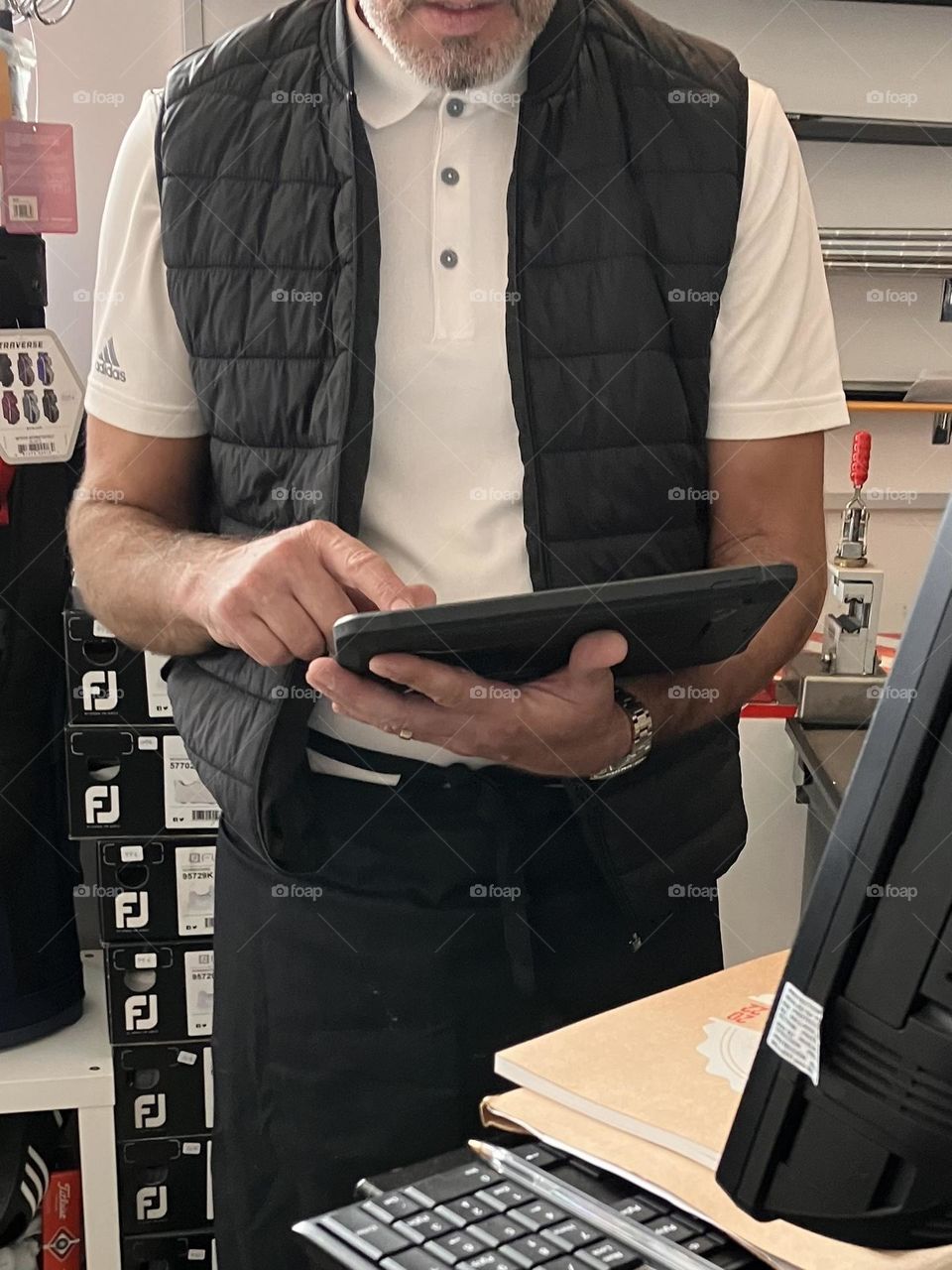 Man at work using pad