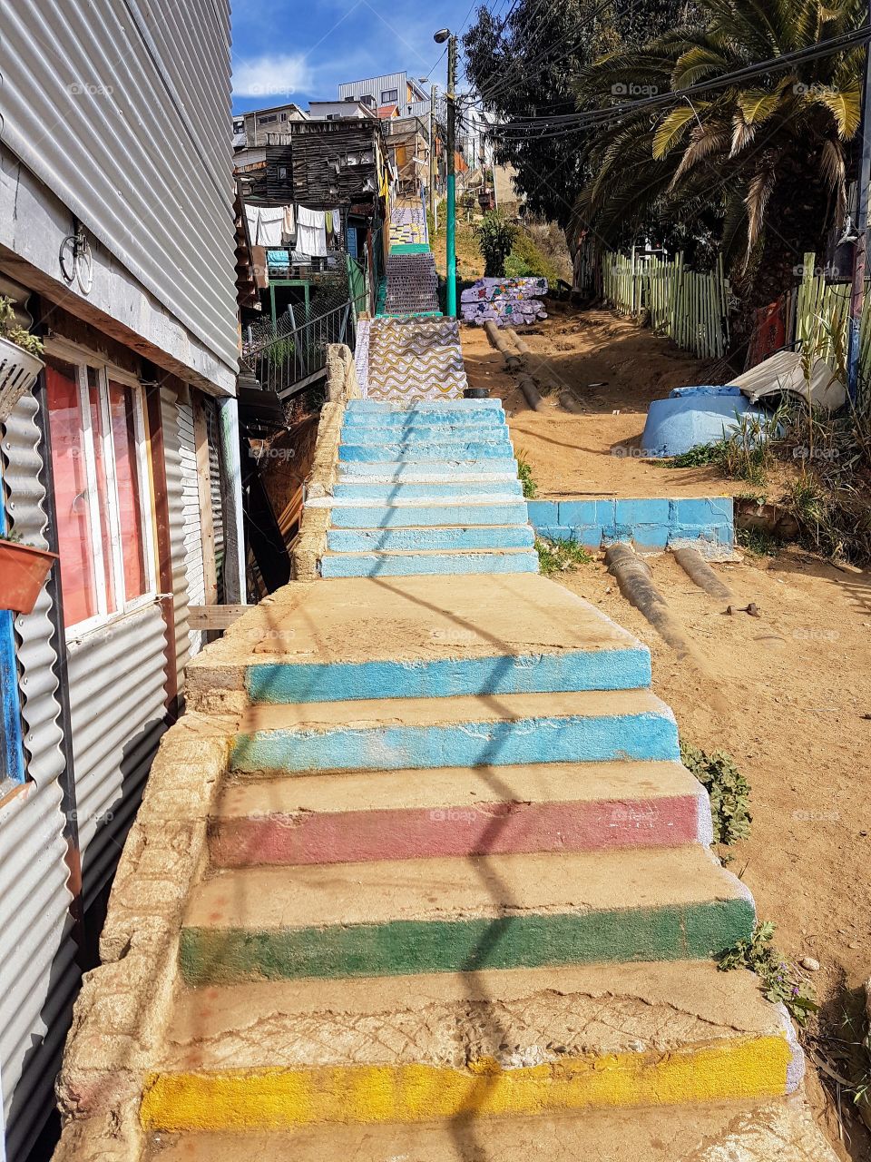 always go higher - colorful stairs in Valparaiso, Chile