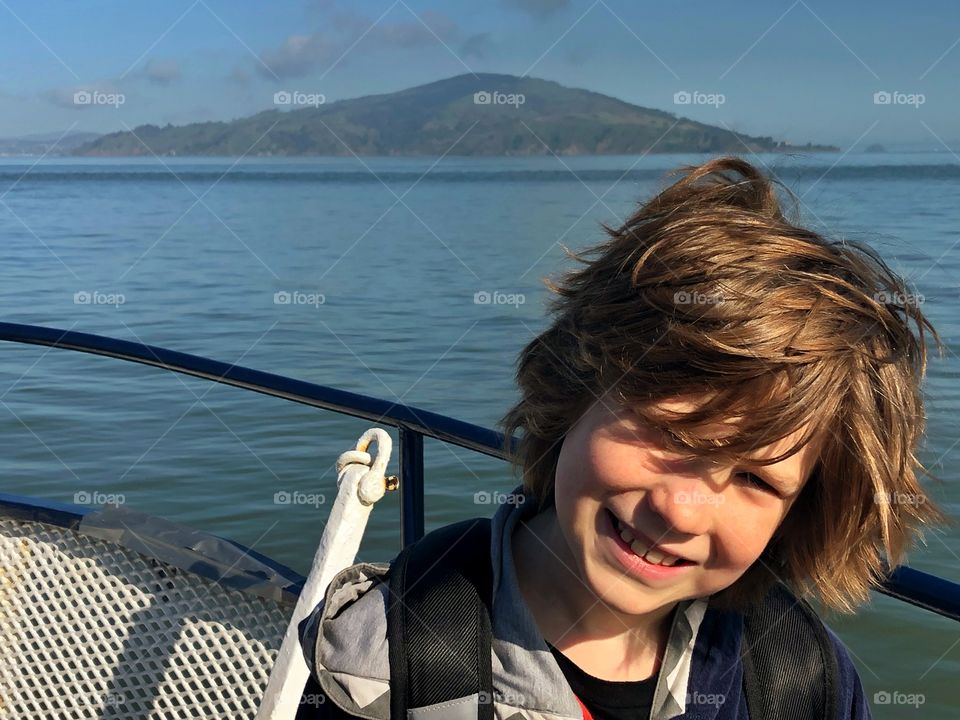 Boy With Big Hair Blowing In The Wind