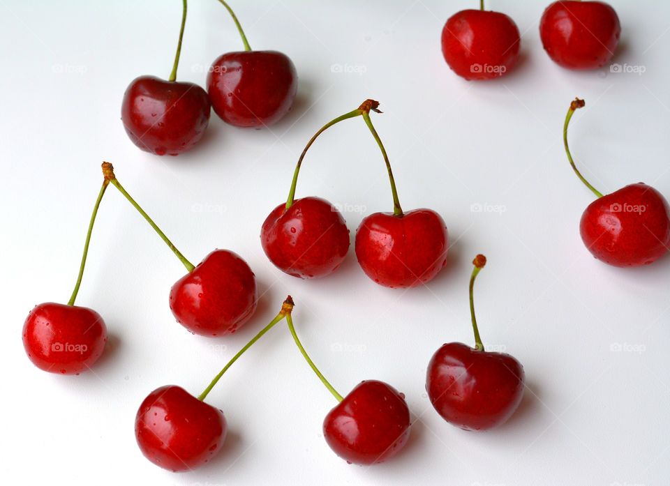 red cherry summer food white background