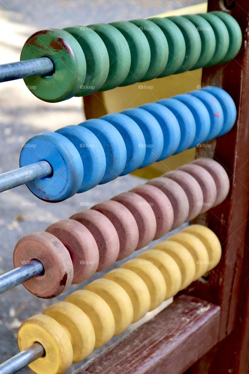 Colorful playing wheels on playground 