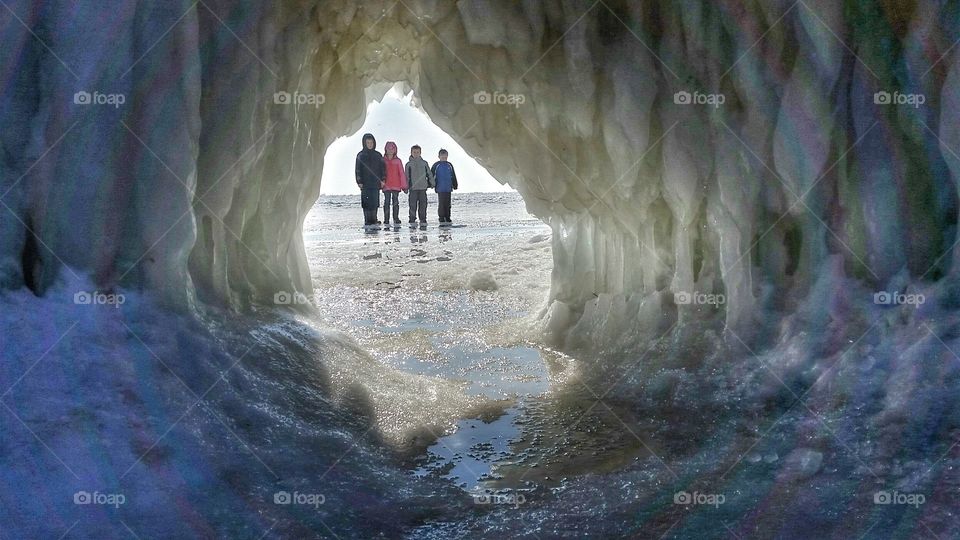 kids through an ice cave