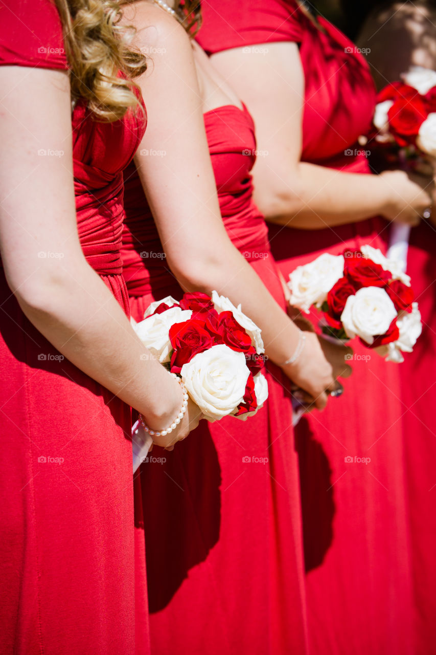 Bridesmaids at the altar outdoors 