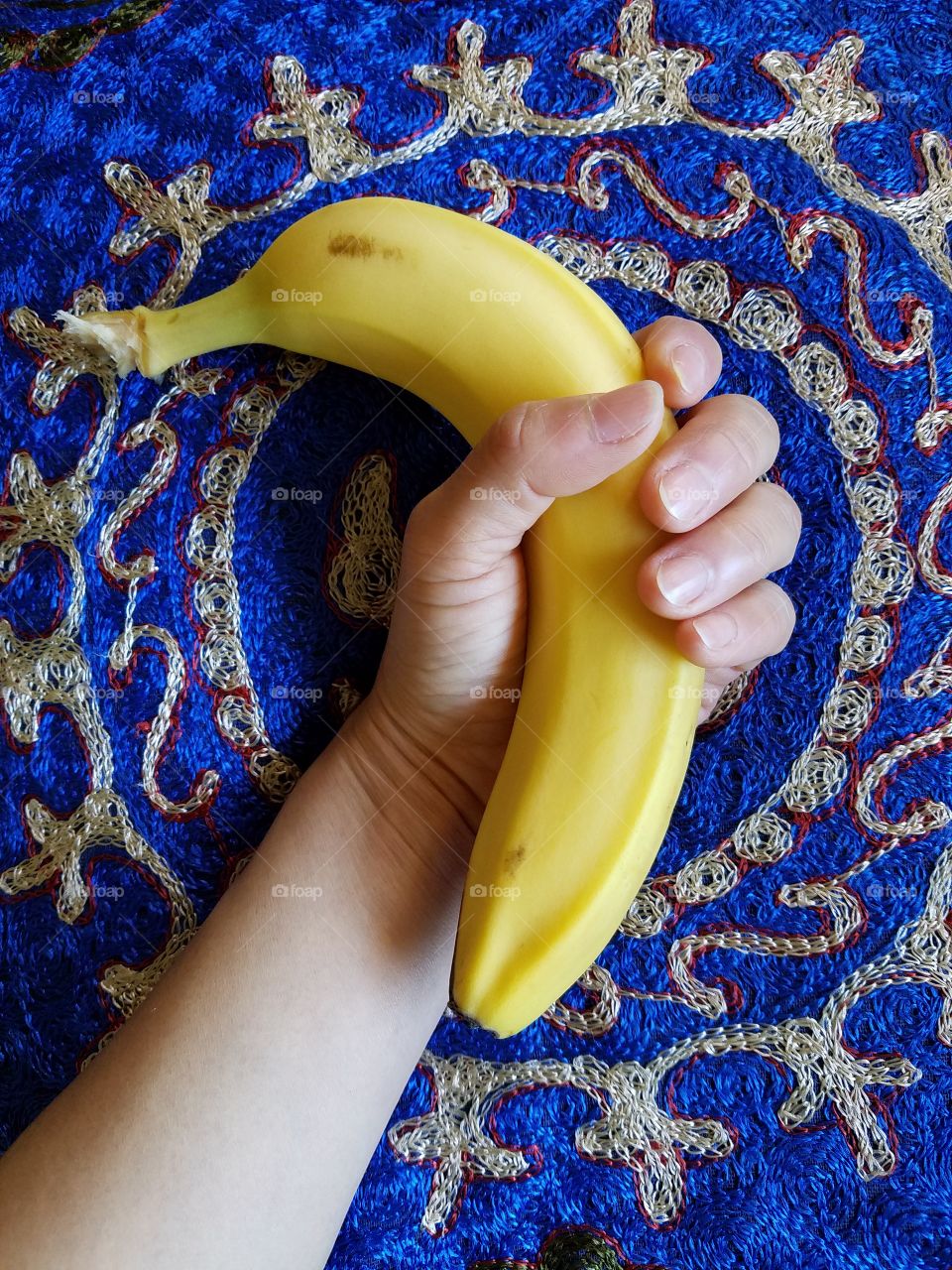 Holding banana