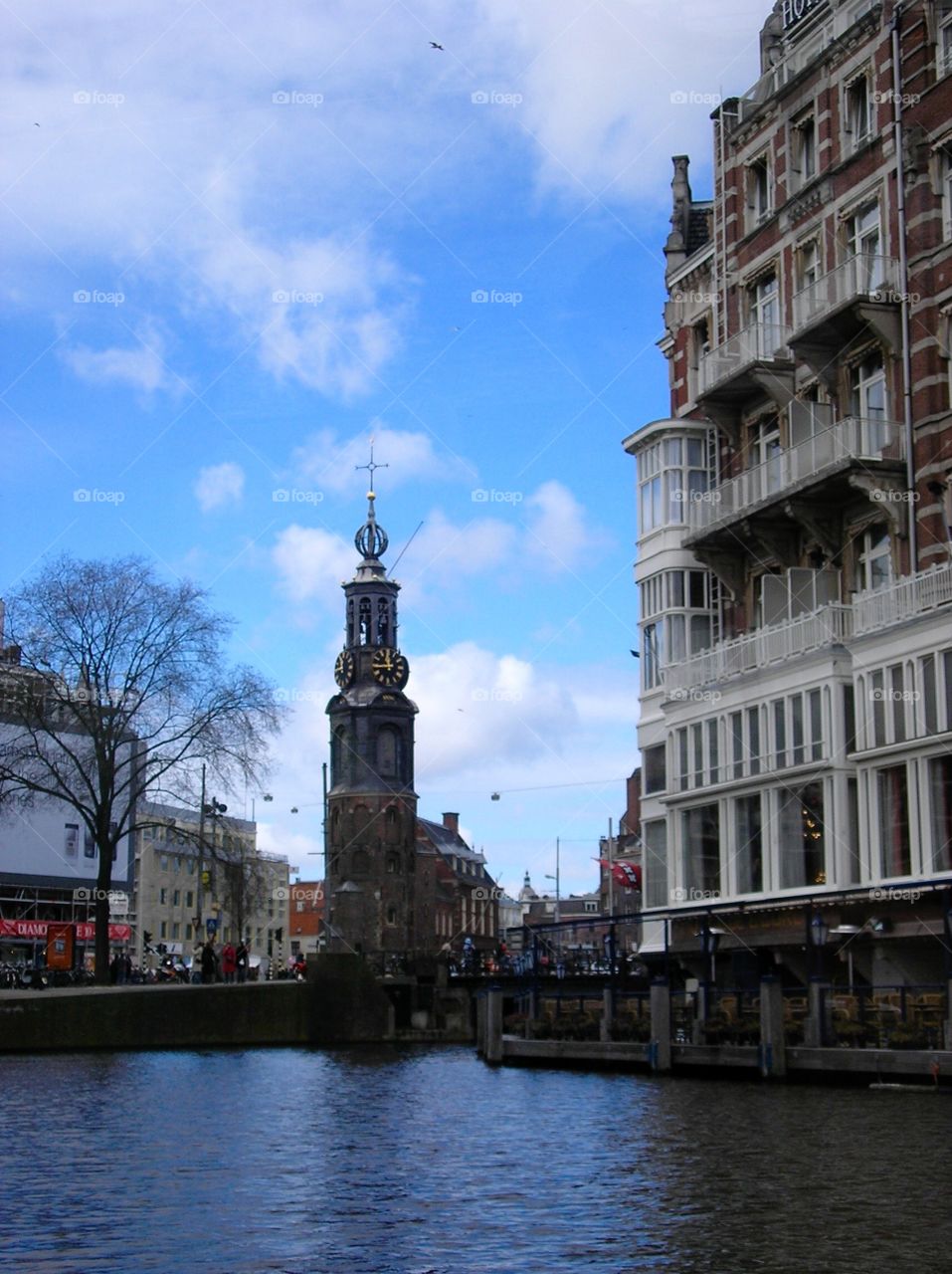 City tower with clock in Amsterdam