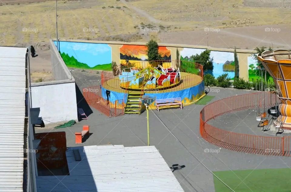 A very beautiful picture, and there is no better picture than it. There is no better picture of green herbs and colorful, red and white roses than it. Glory be to God, the natural and picturesque view, and there is no more