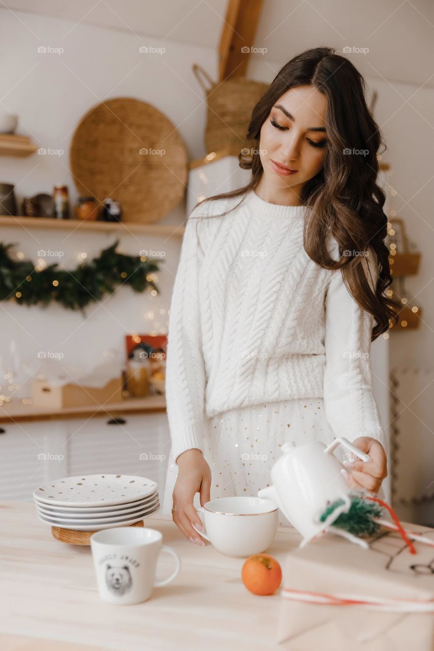 Girl in white clothes take a dinner